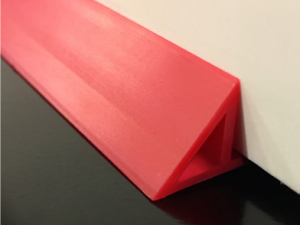 Plasti-Flex-Red HDPE Flanger Chamfer Against The Wall